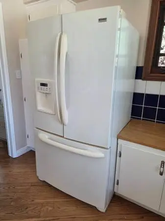 Kenmore Elite Refrigerator and GE Profile Double Oven Range. ALL $200