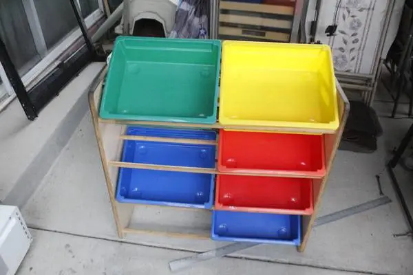 Shelf rack organizer for toys with buckets