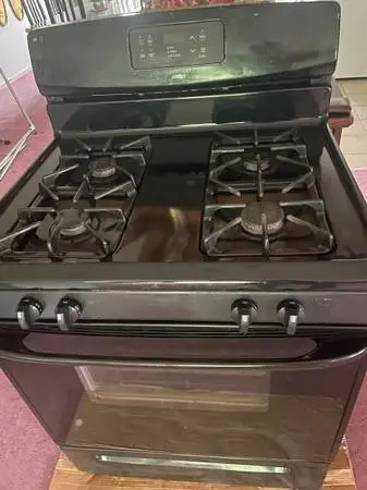 #### KENMORE  BLACK  STOVE WITH SELF CLEANING ###