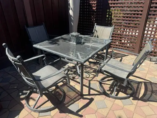 Garden Out door set: 4 Rust proff Chairs and Matching Glass Table