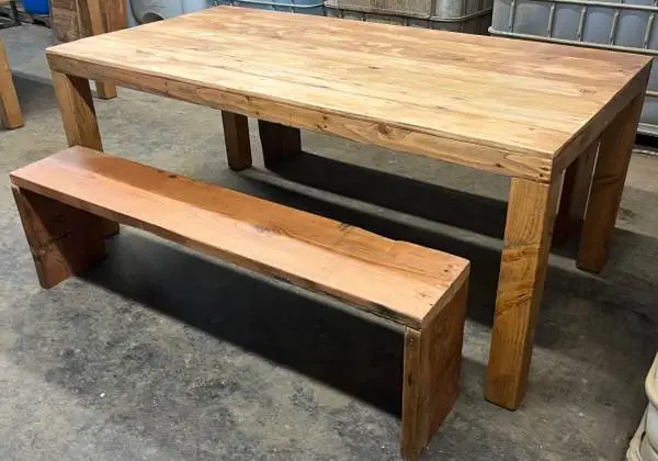wood dining table with two benches