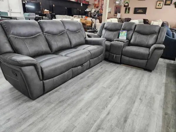 Grey Sofa and Loveseat. Sofa has Drop Down Console With Power! Both Ha