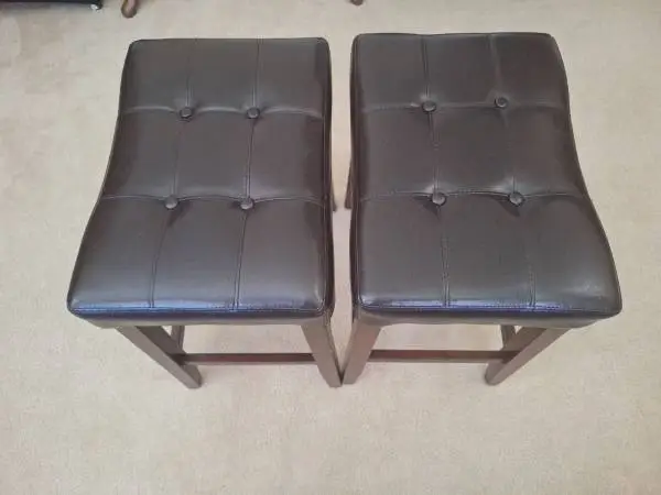Leather piano stool. Sturdy and comfortable(one of two sold)