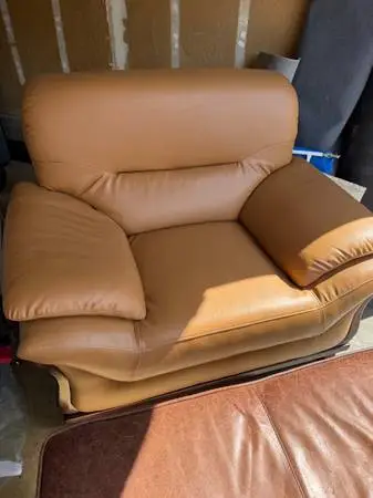 Oversized leather seat and ottoman