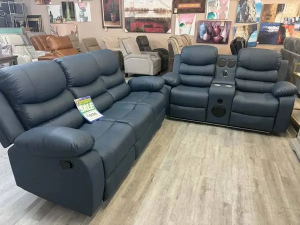 Blue Manual Reclining Sofa and Loveseat