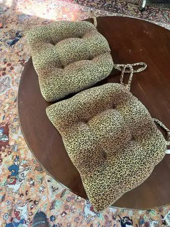 Two Leopard / Cheetah print chair cushions made by Newport