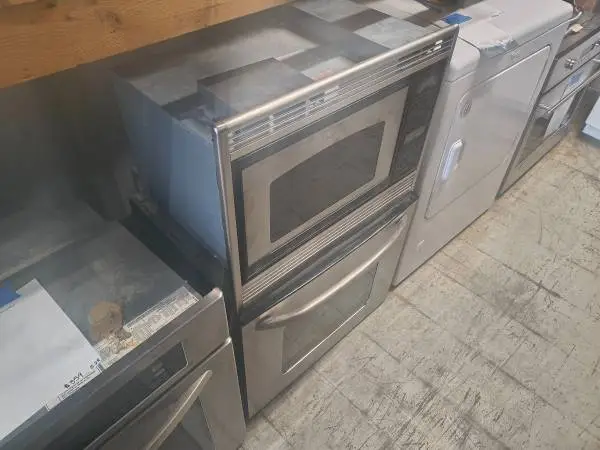 27W SS GE Combination Wall Oven 3.9 Cu Ft Model # JKP90SOM1SS Used