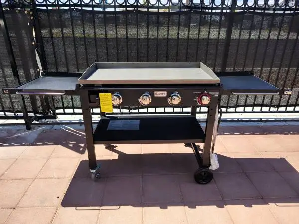 New. Razor Griddle 37in 4 Burner LP Propane Gas Grill for Outdoor Use.