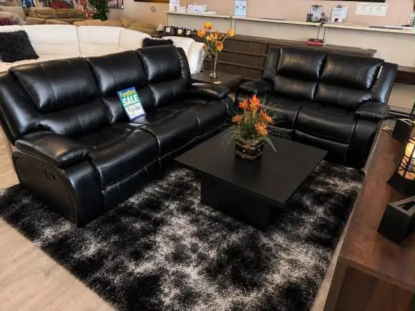 Black Manual Reclining Sofa and Loveseat