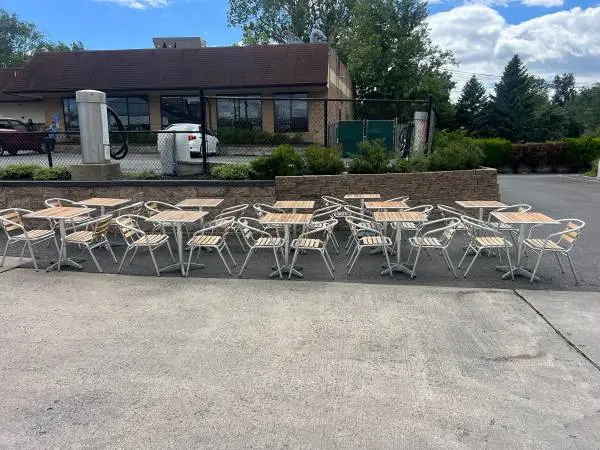 11 outdoor tables with 22 chairs