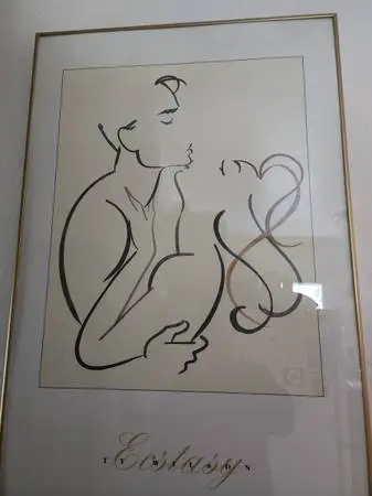 Two large framed art work by Ty Wilson.