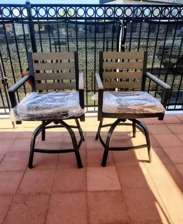 New. Agio Nicolet 2-piece Outdoor Patio High  Swivel Chairs.
