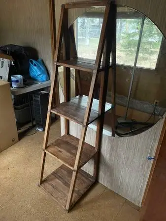 Tall wooden open bookcase