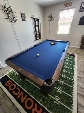 Rare Diamondback Billiards table with autographed guitar pick inlays