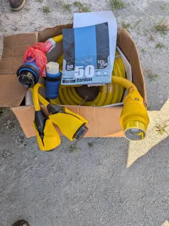 New 50amp shore power cord & splitter, sailboat ladder and more.