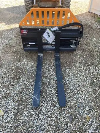 Skid steer side shift forks
