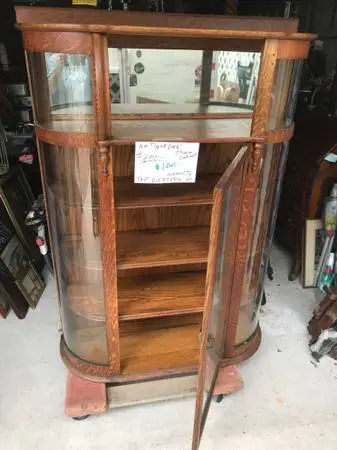 Oak China cabinet mirror bow glass $200-reduced $100- 41”wide(estateS