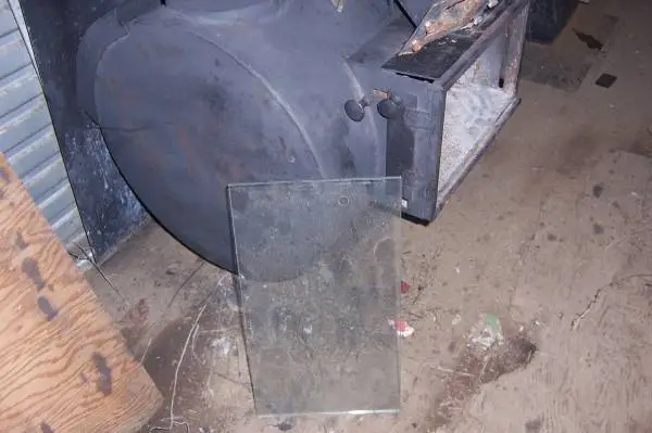 small  pellet  stove, front glass for viewing, very sweet little stove
