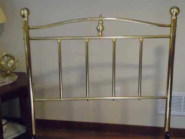 Brass bed and frame.