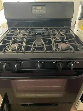 #### 5 BURNERS FRIGIDAIRE BLACK STOVE WITH SELF CLEANING ##