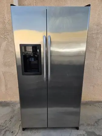 GE Refurbished stainless steel side by side ice-water