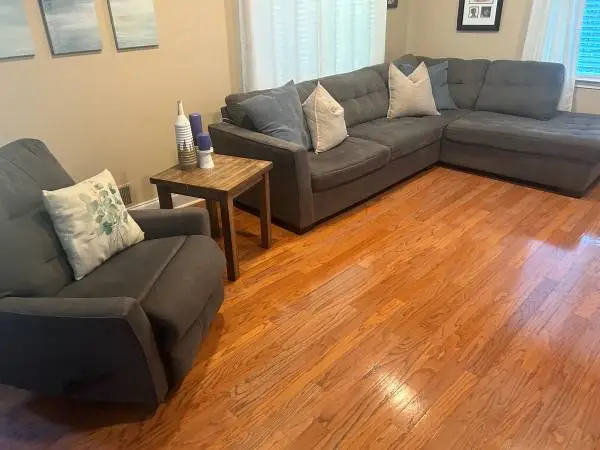 Grey sectional with recliner chair