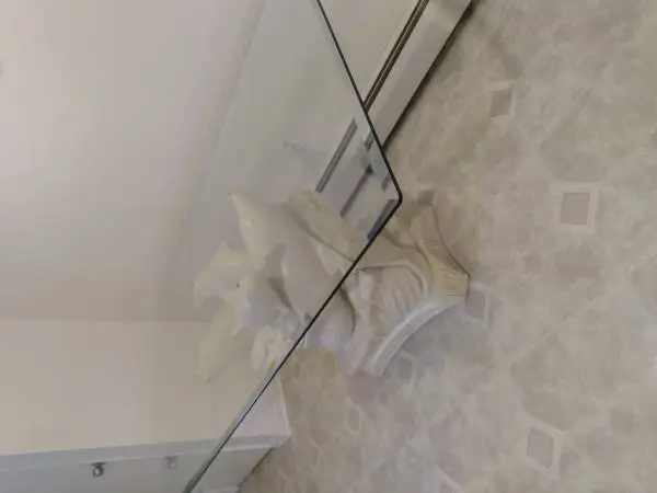 glass dolphin  dining table