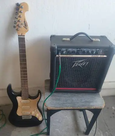 Peavey Rage 158 Amplifier with Washburn Lyon Guitar