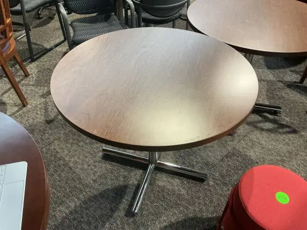 36 round conference table by Knoll in Rustic Walnut