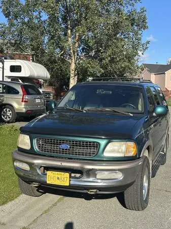 1997 Ford Eddie Bauer Exoedition + set of newer studded tires on rims