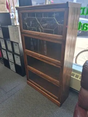 Shelf with lift up glass doors