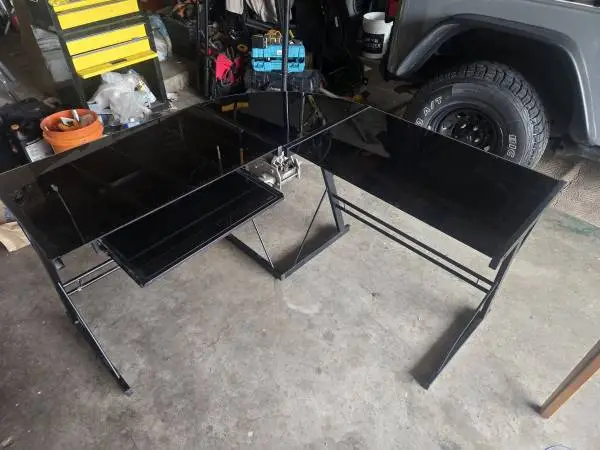 Corner glass and steel desk