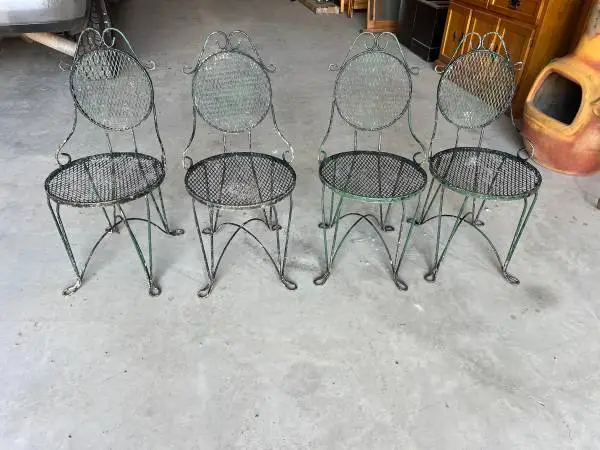 Four Wrought Iron Bistro Chairs