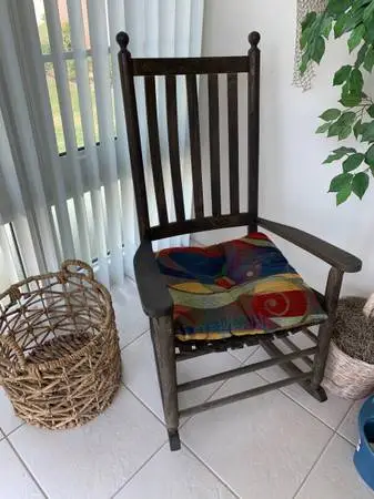 Beautiful wood rocking chair with cushion