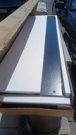 Three complete looking boxes with stuff inside.