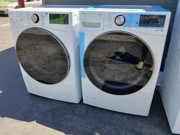 Lg thinq white steam front load washer and gas dryer New
