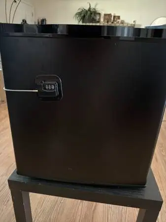 Mini fridge with changable lock