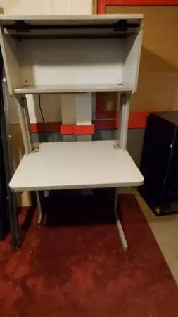 Desk with overhead storage and light