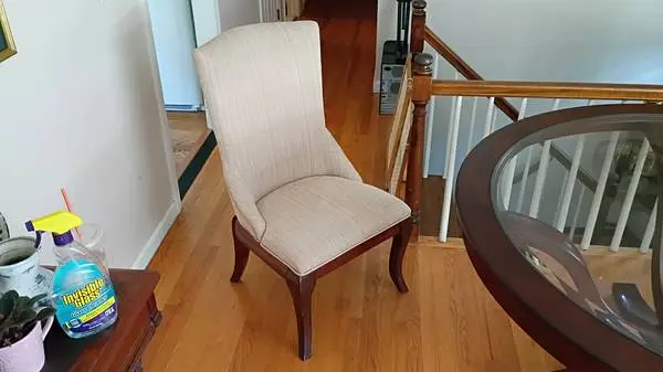 Fancy chairs with wood legs, soft fabric and no arms