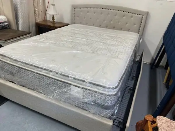 Queen size platform bed with storage drawer