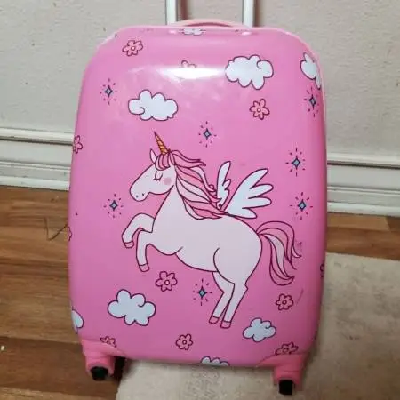 small pink suitcase