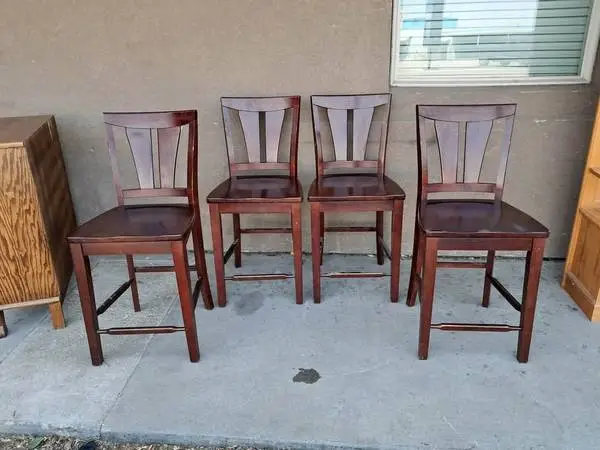 Very nice solid wood set of four matching barstools 24 inch tall count
