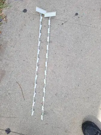 Metal strip with header and 12 alligator clips