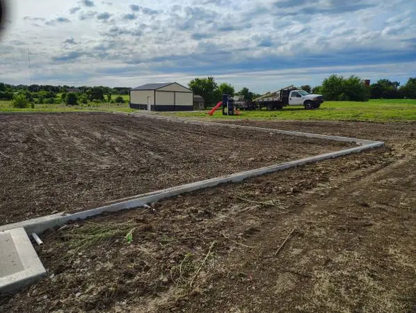 Gravel,dirt, concrete tear out and replace