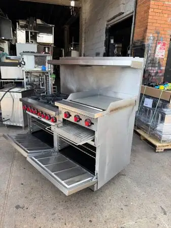 Six burner stove with grill and two oven / restaurant equipment