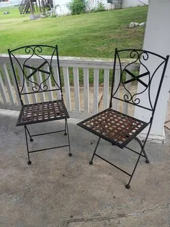 Vintage pair of wrought iron folding deck/patio chairs