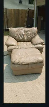 Leather oversized chair and ottman