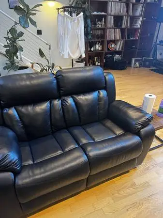 62 Reclining leather loveseat
