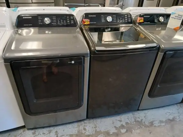 Samsung black top loading washer and gas dryer