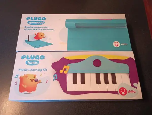 PLUGO Tunes Game Pad & Music Learning Keyboard Use Device w/Free App